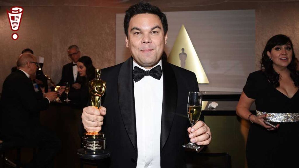 Academy Award winner Robert Lopez poses with award for Best Original Song 'Remember Me' for 'Coco' at the 90th Annual Academy Awards Governors Ball at Hollywood & Highland Center on March 4, 2018 in Hollywood, California. (Photo by Kevork Djansezian/Getty Images)