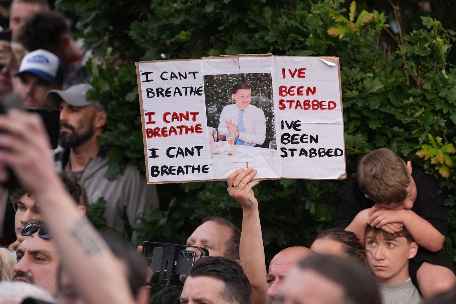 Elon Musk and America’s Far Right Stoke Anger Over Murder of UK Teen Image may contain Adult Person Accessories Formal Wear Tie Baby Face Head People Parade and Text