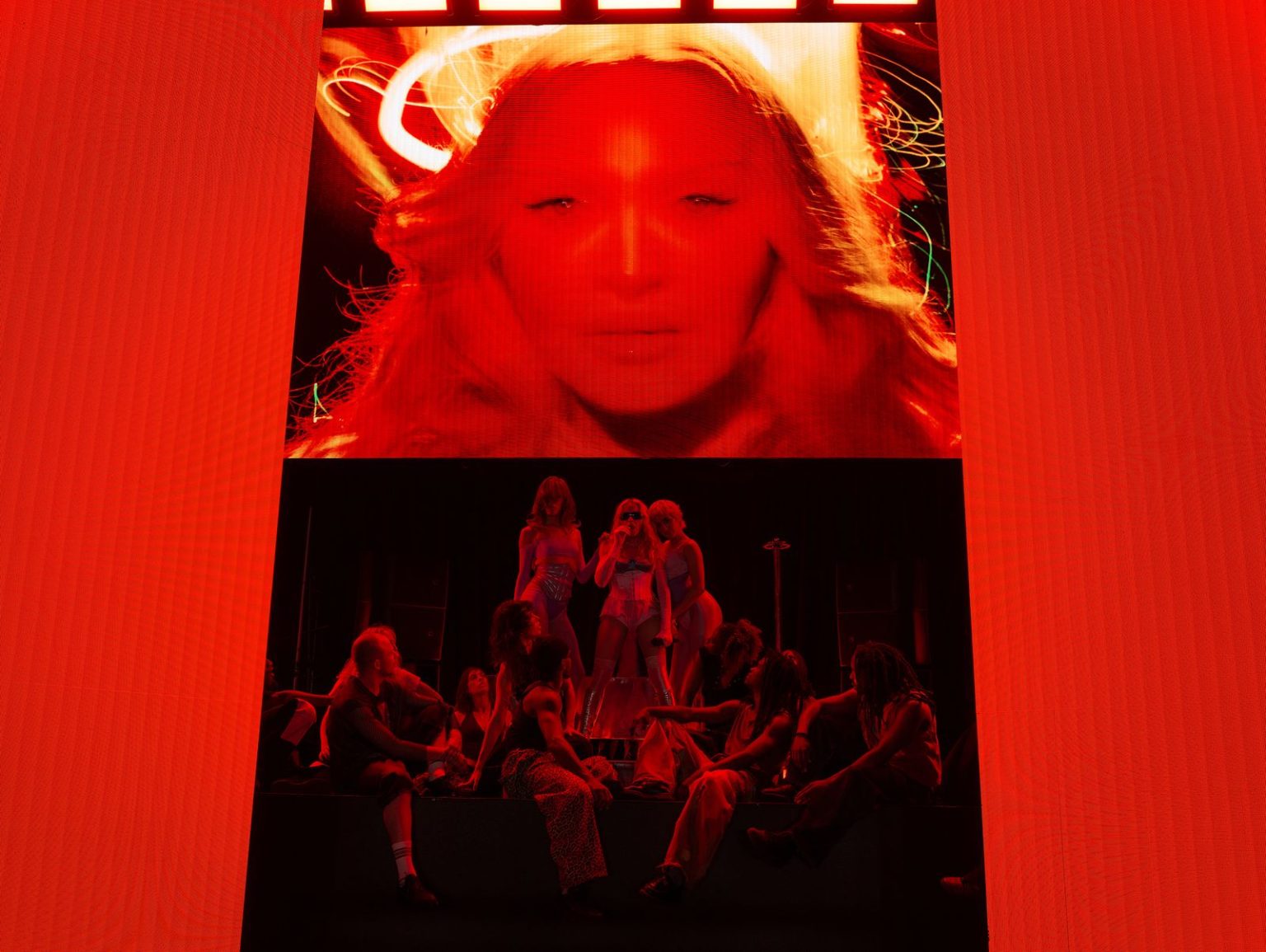 Photo of Madonna coming out on stage in Time Square