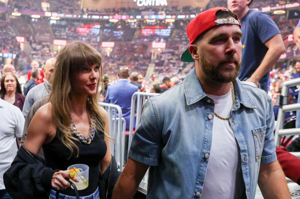 After weeks of speculation, Taylor Swift, Travis Kelce wed in New York : NPR Taylor Swift and Travis Kelce of the Kansas City Chiefs, pictured at a basketball game in May.