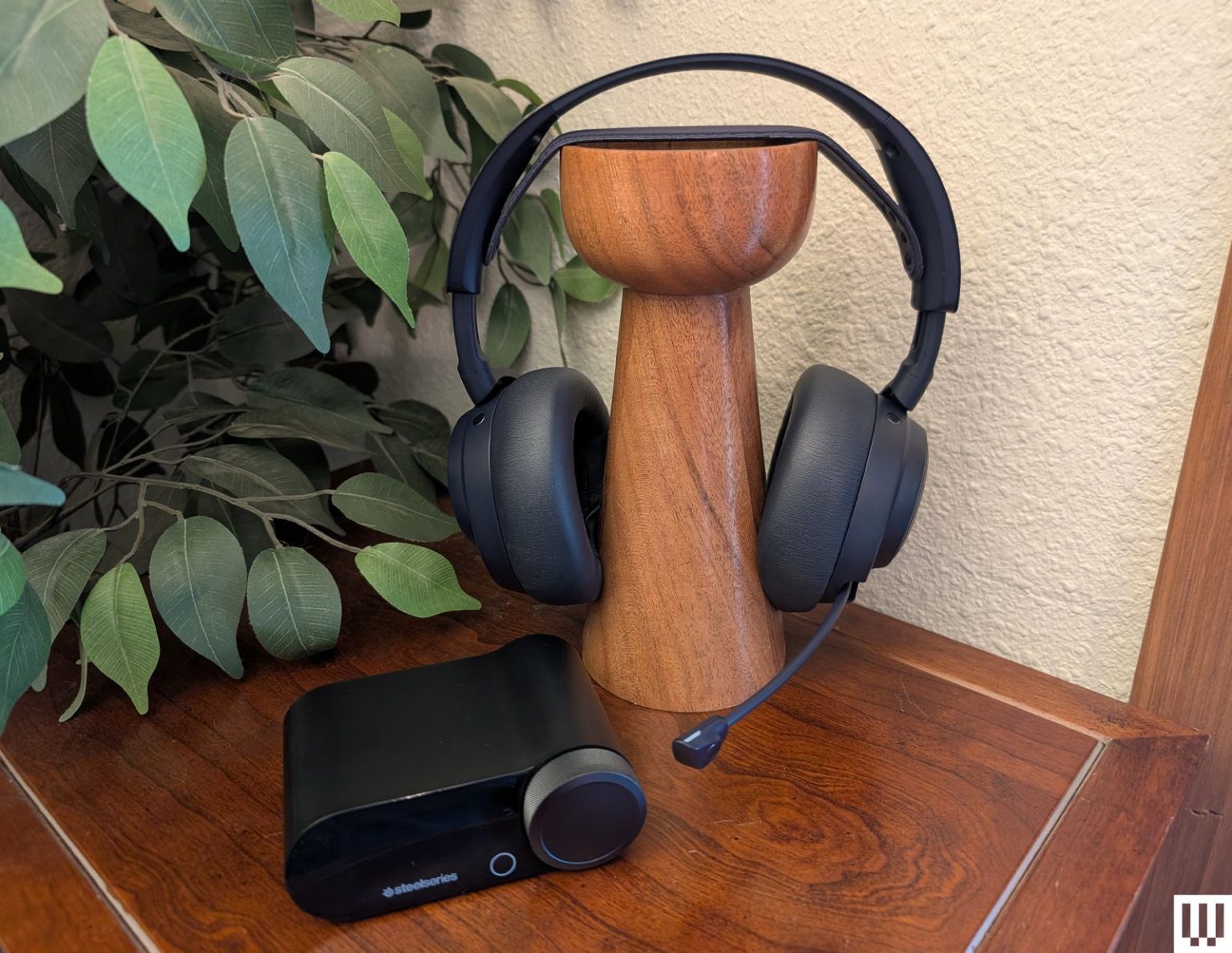 Image may contain Wood Hardwood Stained Wood Electronics and Headphones