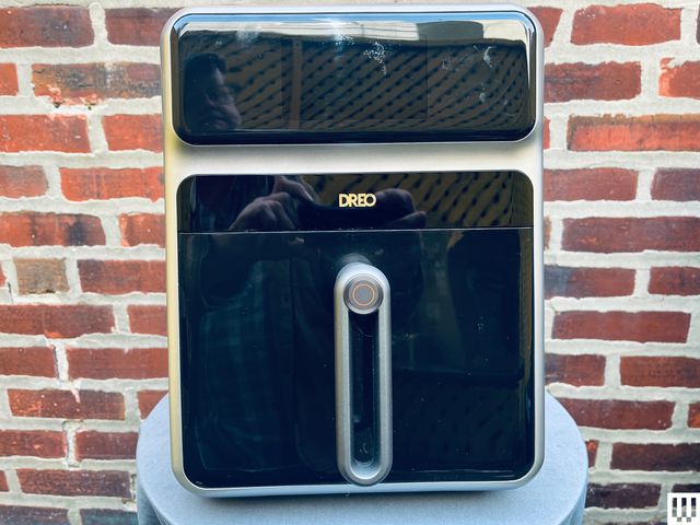 Dreo Summer Flash Sale 2026: Lowest Price Ever on Chefmaker, Fan Dreo Chefmaker Combi Fryer sitting on a white table in front of a brick wall